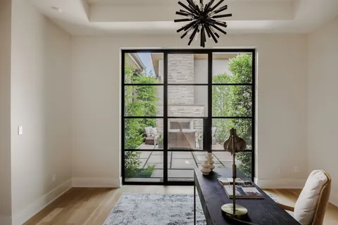 a view of a livingroom with furniture and window