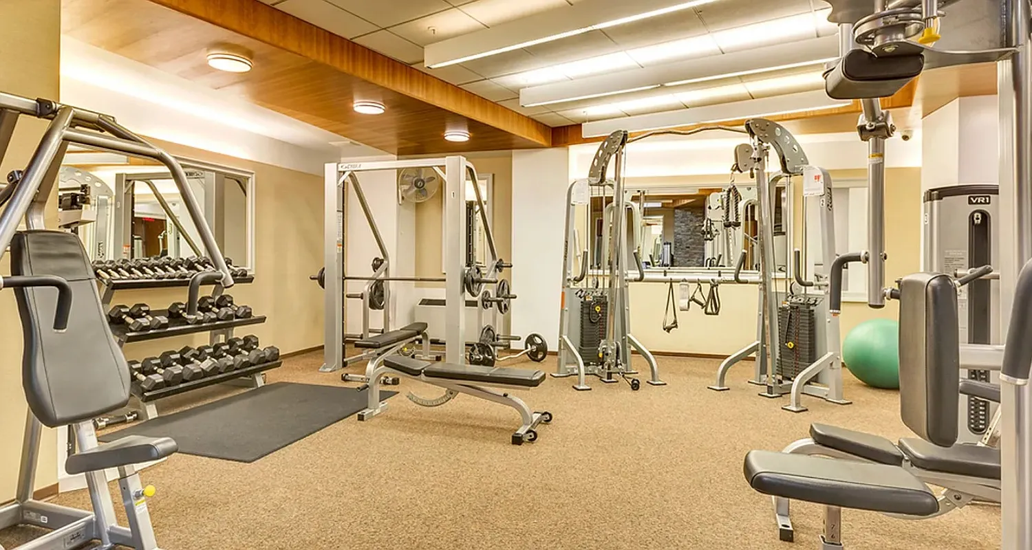 99 John Street, Unit 1101 Manhattan, NY 10038 - Photo 15 of 16 a view of a room with gym equipment