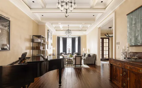 a view of a living room and dining room