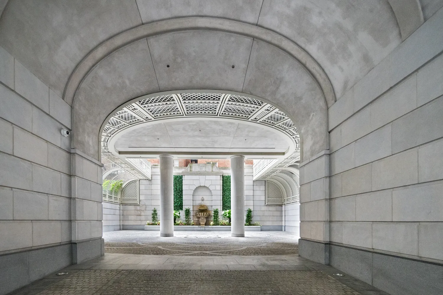 a view of a hallway with seating area