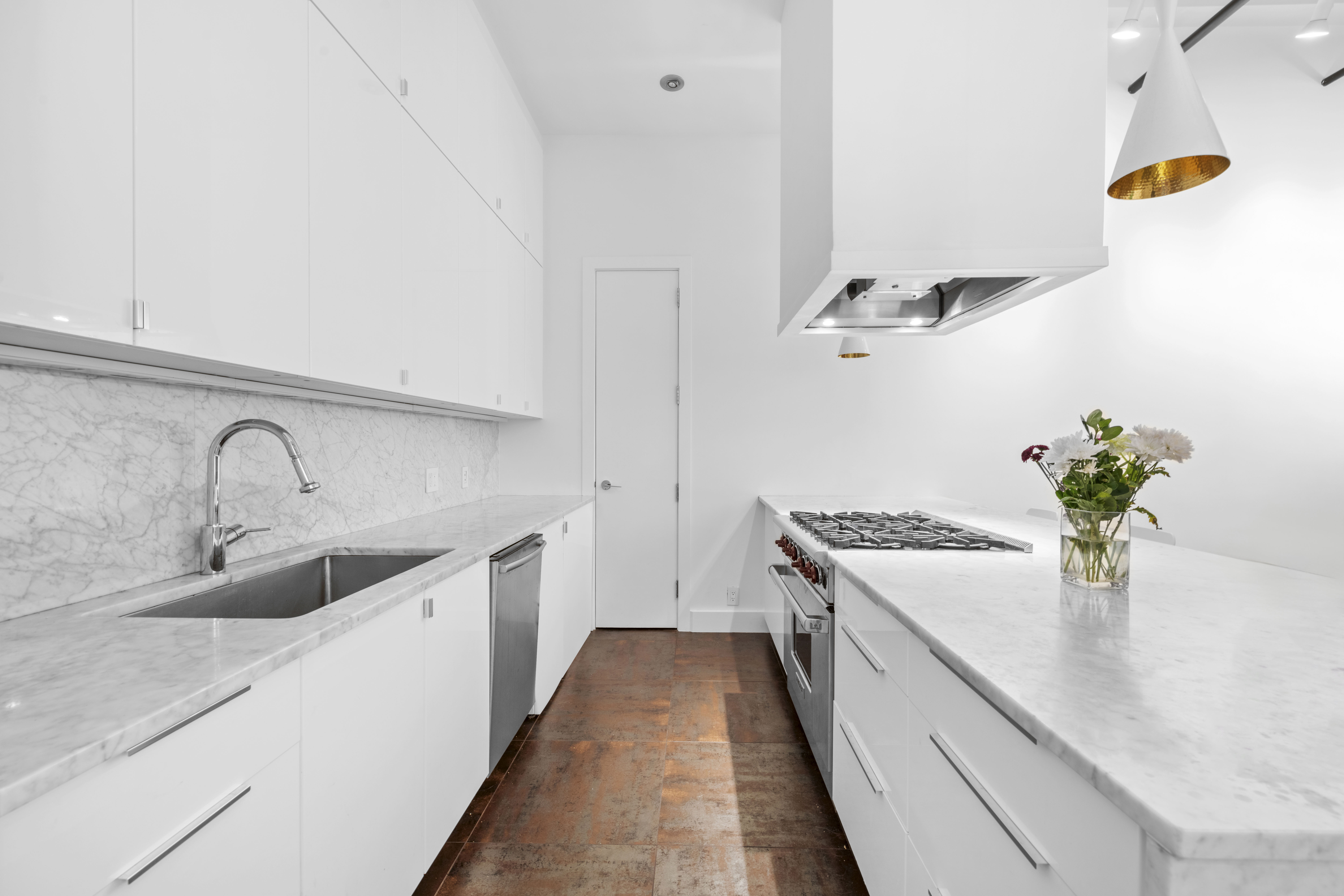 60 Collister Street, Unit 1B Manhattan, NY 10013 - Photo 5 of 20 a kitchen with a sink and stove