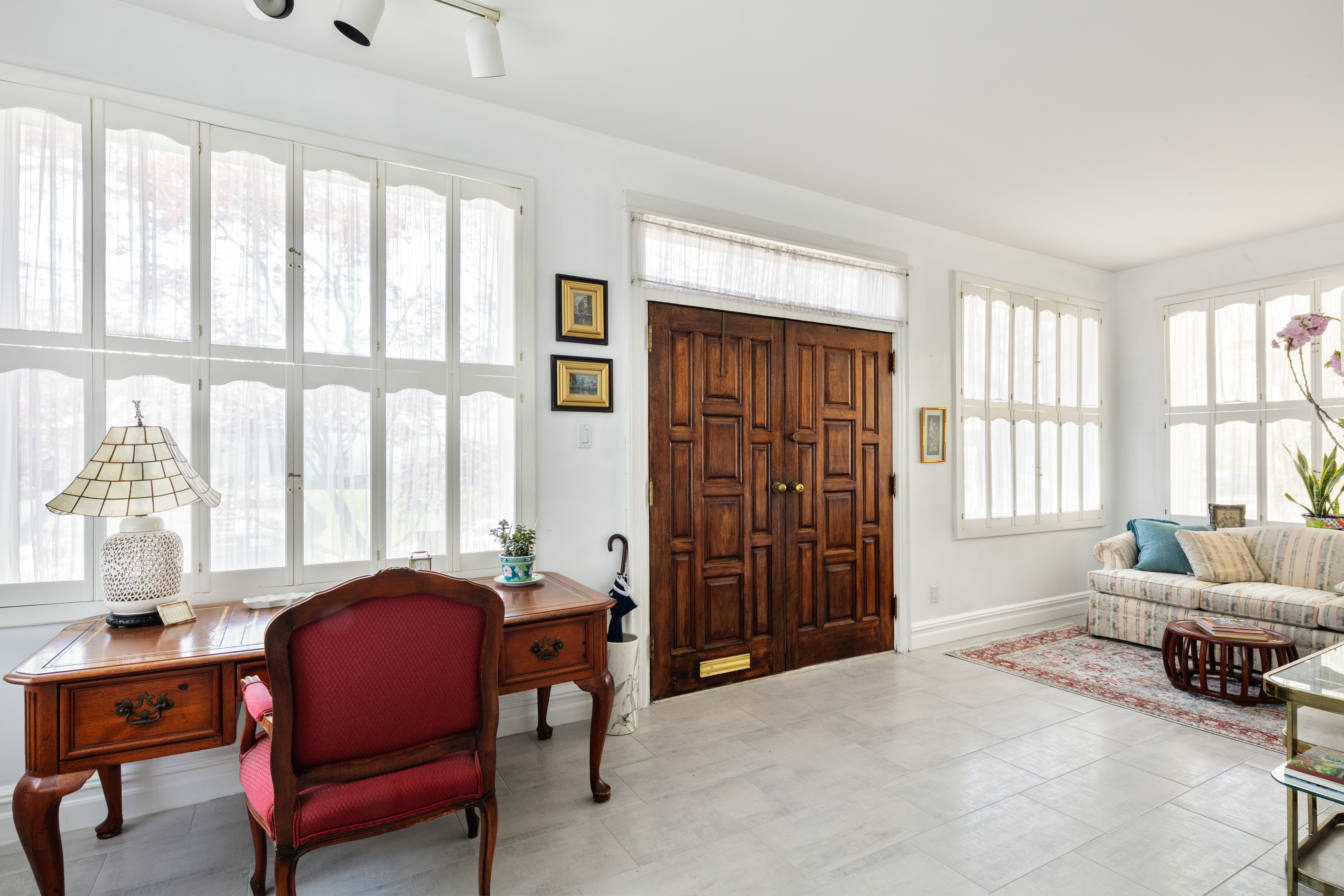 91 81st Street Brooklyn, NY 11209 - Photo 4 of 19 a living room with furniture and a window
