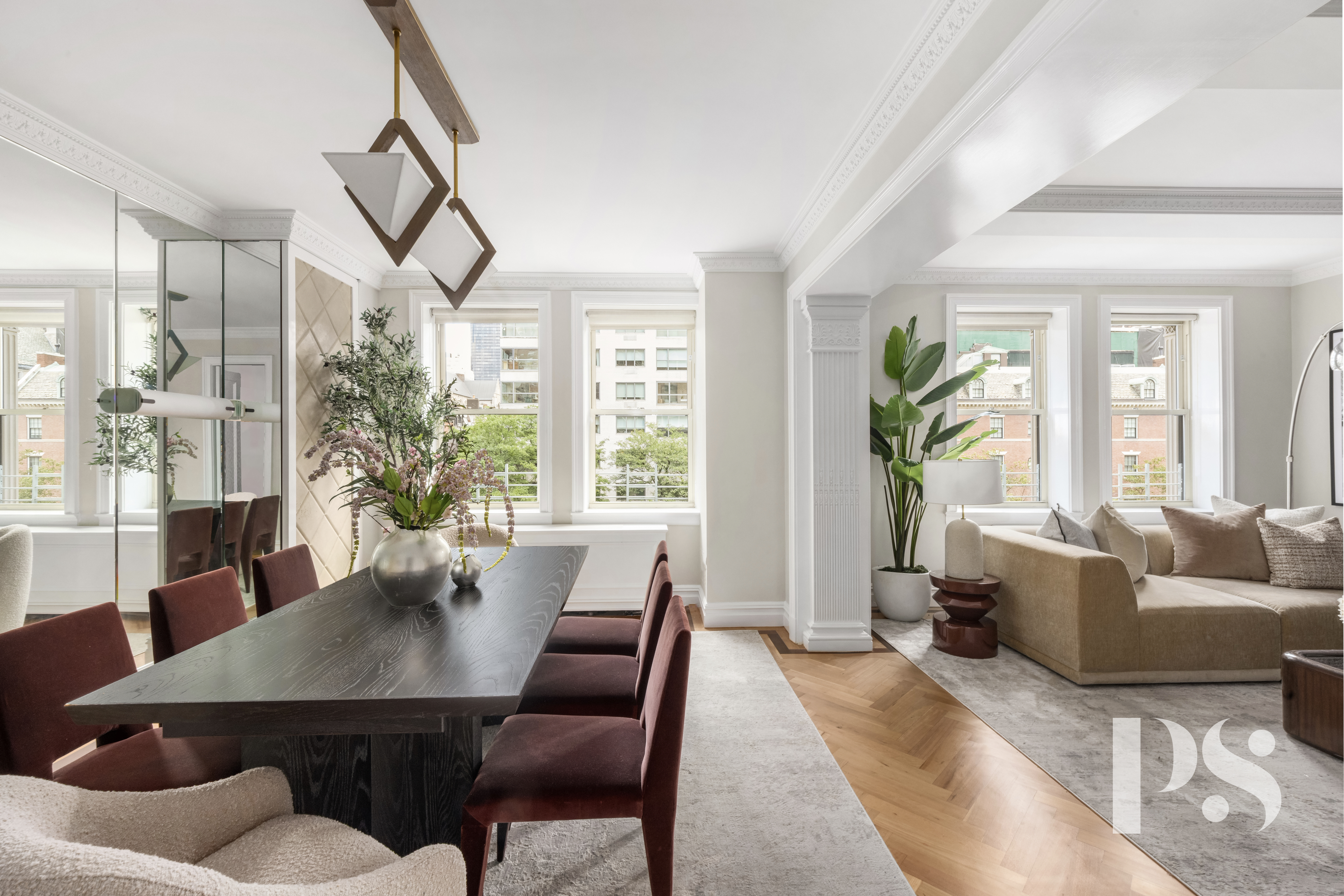 610 Park Avenue, Unit 4B Manhattan, NY 10065 - Photo 10 of 22 a living room with furniture and a large window