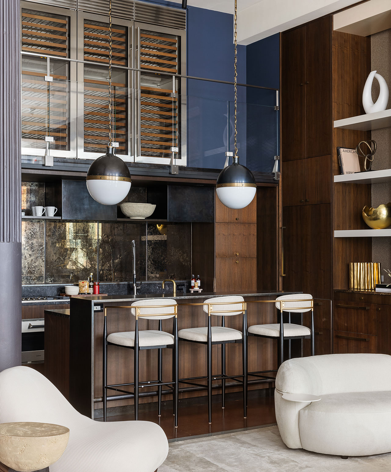 56 Crosby Street, Unit 2A Manhattan, NY 10012 - Photo 7 of 21 a kitchen with a table chairs and a wooden floor