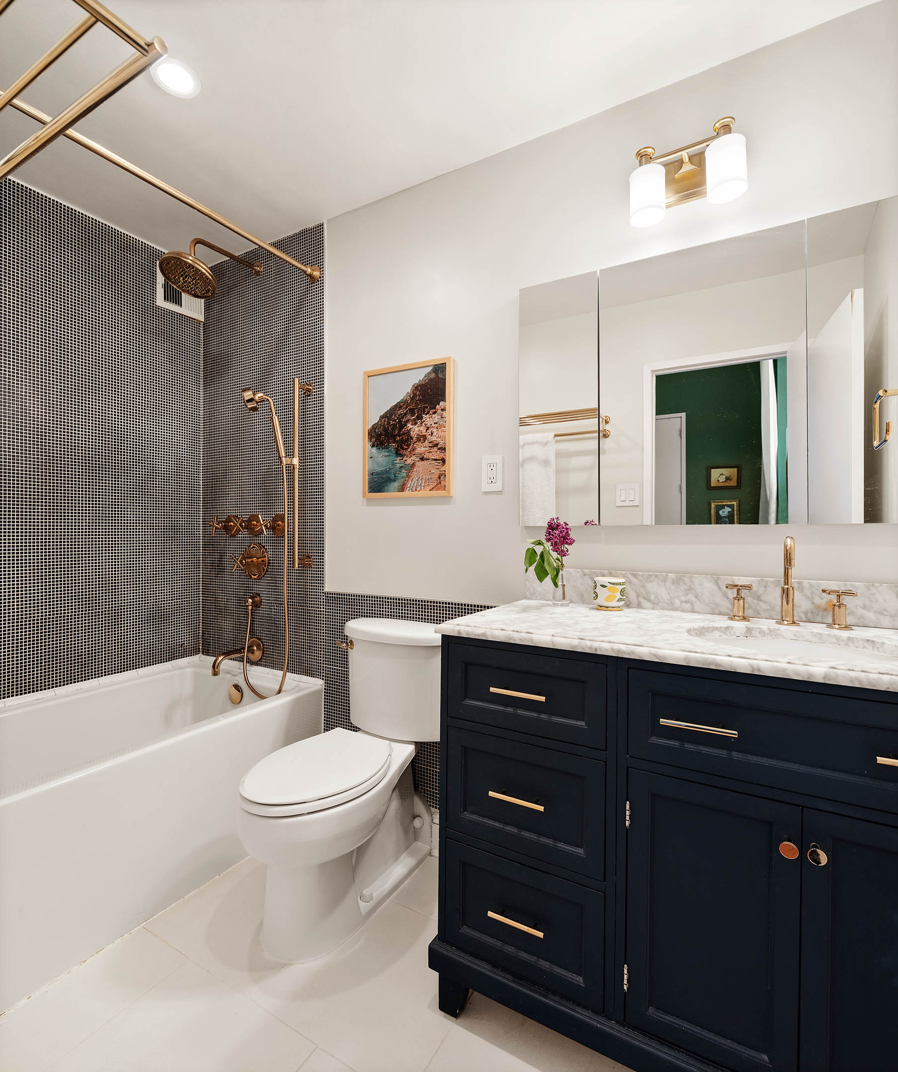 1 Tiffany Place, Unit 2F Brooklyn, NY 11231 - Photo 5 of 12 a bathroom with a sink a toilet and a bathtub