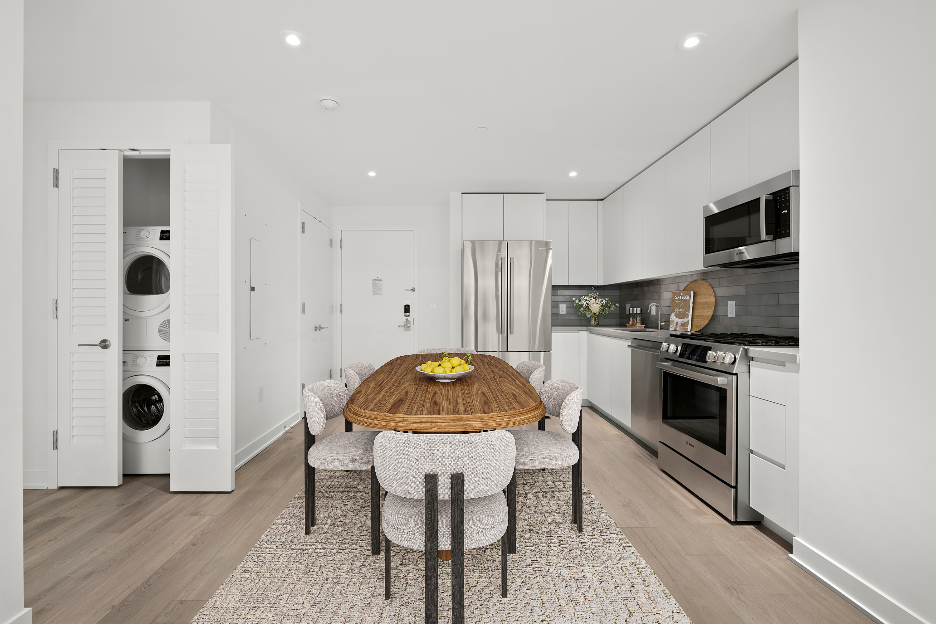 160 Front Street, Unit 517 Brooklyn, NY 11201 - Photo 3 of 14 a kitchen with stainless steel appliances granite countertop a stove a sink a refrigerator and a microwave