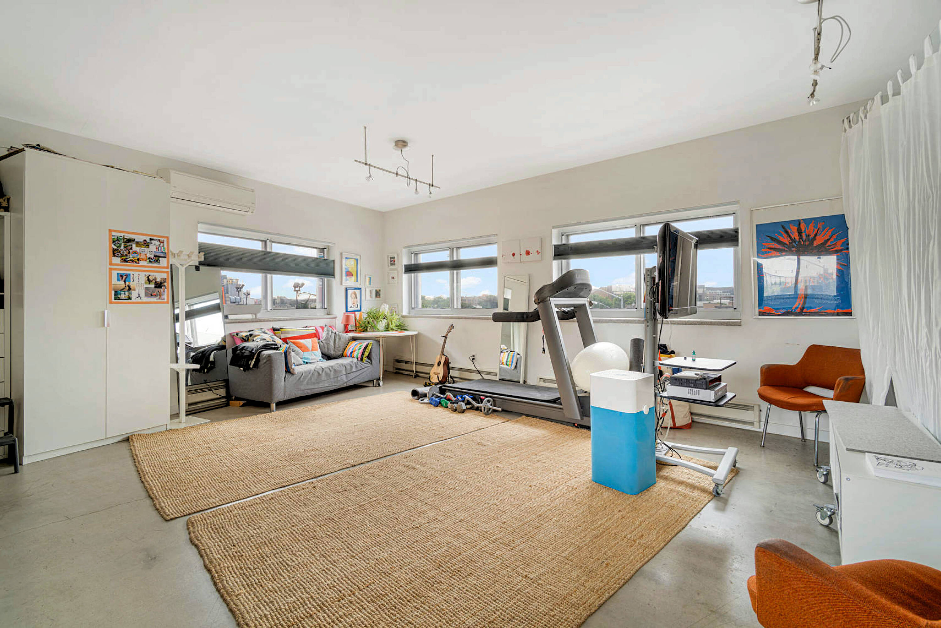 251 Montrose Avenue Brooklyn, NY 11206 - Photo 9 of 15 a view of a livingroom with lounge chair