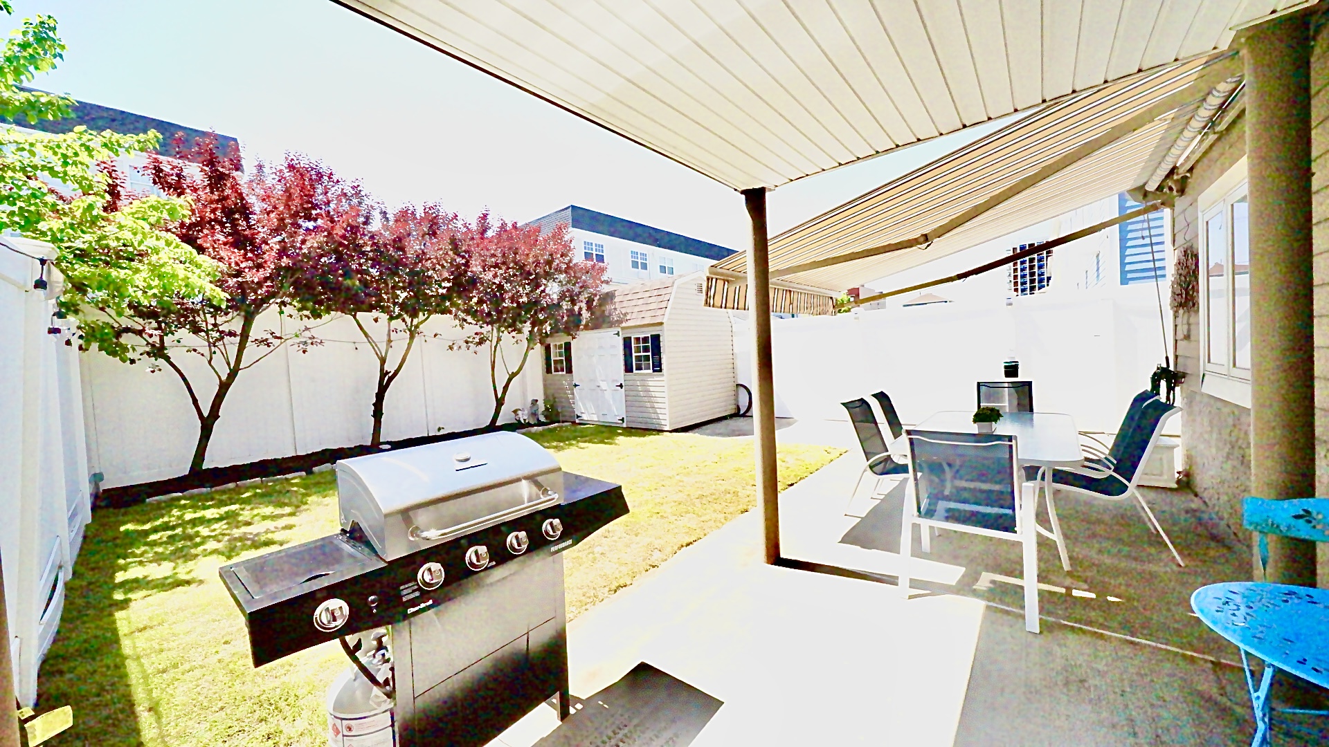1-69 Beach 98th Street, Unit 1 Queens, NY 11694 - Photo 21 of 23 a view of a chairs and table in the patio