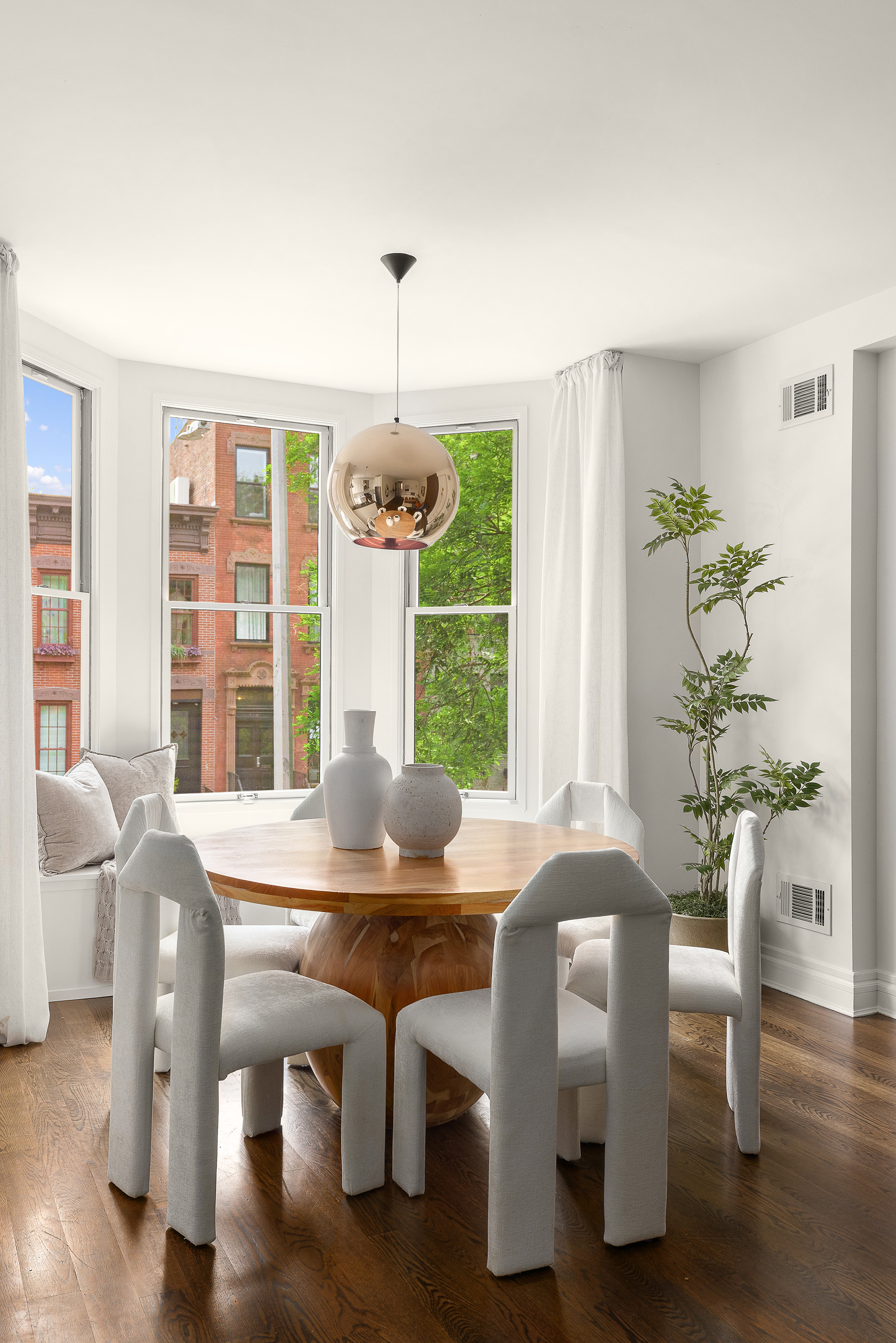 695 Degraw Street, Unit 2 Brooklyn, NY 11217 - Photo 3 of 11 a view of a dining room with furniture window and wooden floor