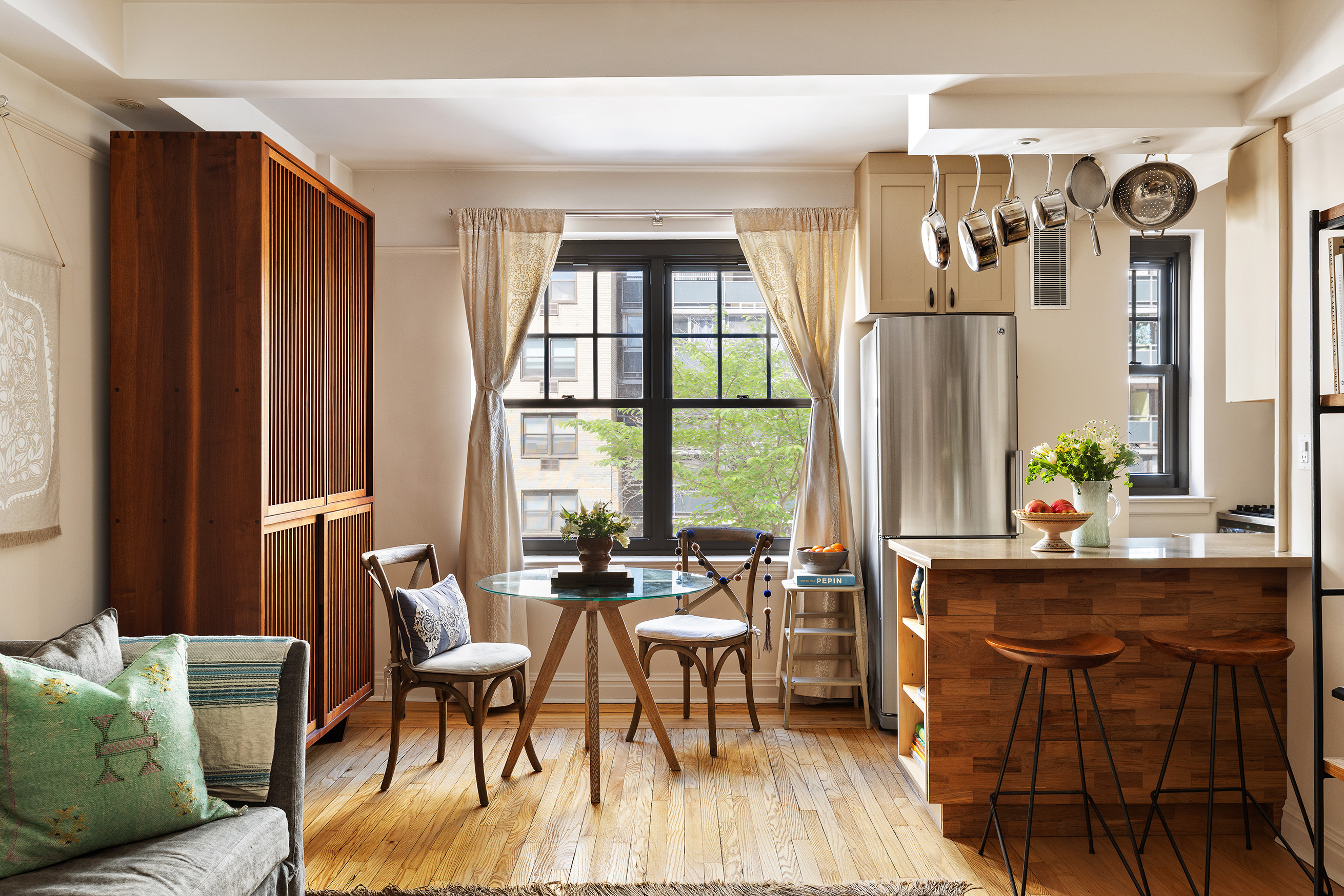 200 East 16th Street, Unit 5LM Manhattan, NY 10003 - Photo 2 of 16 a dining room with furniture and window