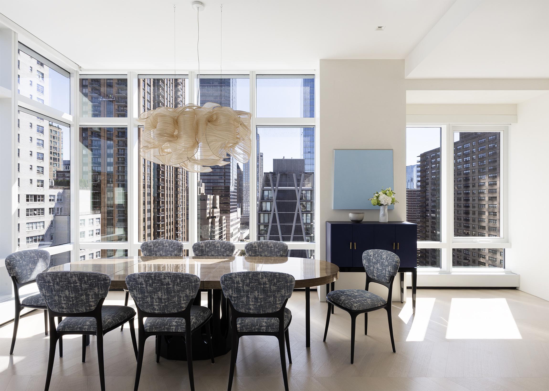 200 Amsterdam Avenue, Unit 17A Manhattan, NY 10023 - Photo 3 of 24 a dining room with furniture and window