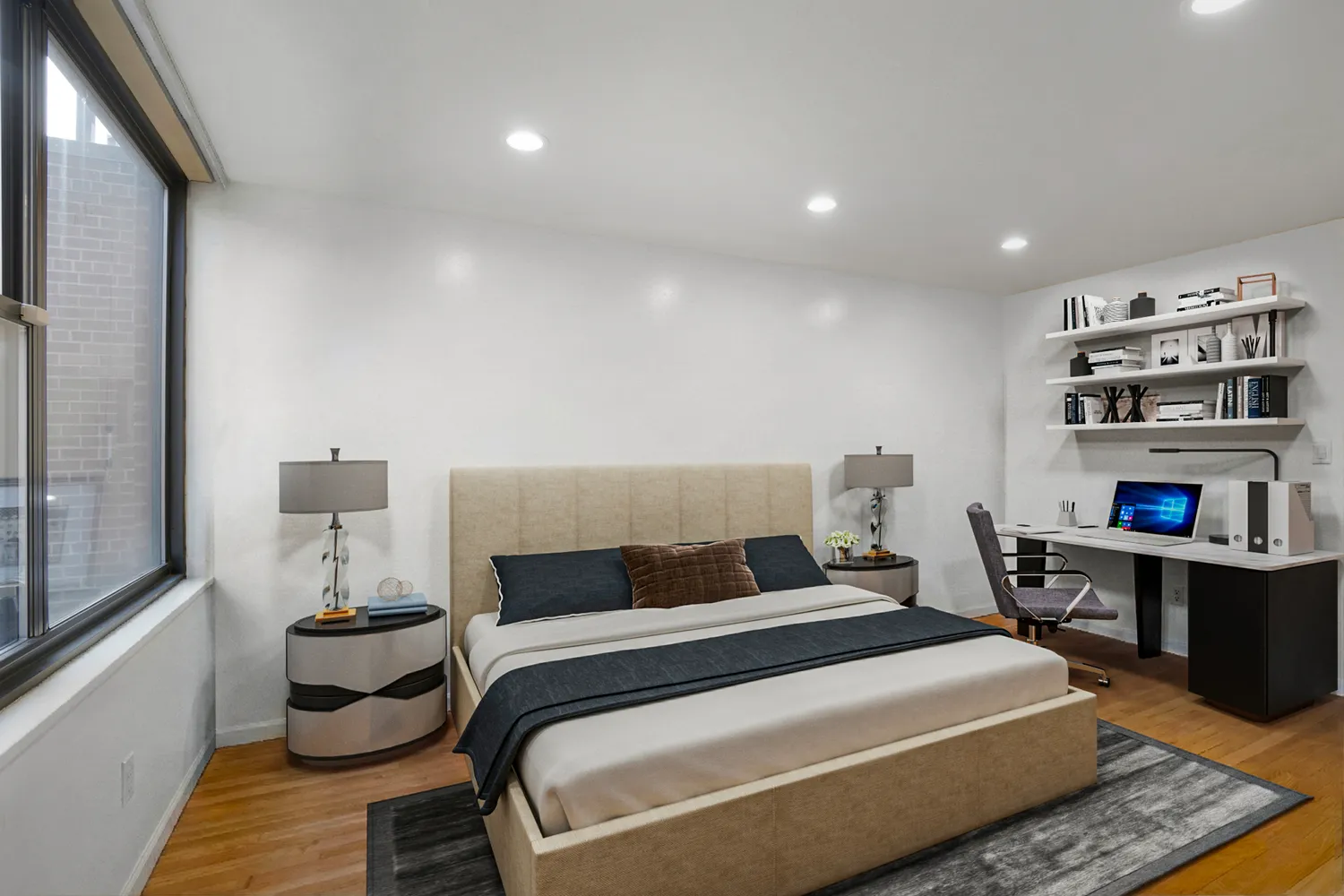 a bedroom with a bed and wooden floor