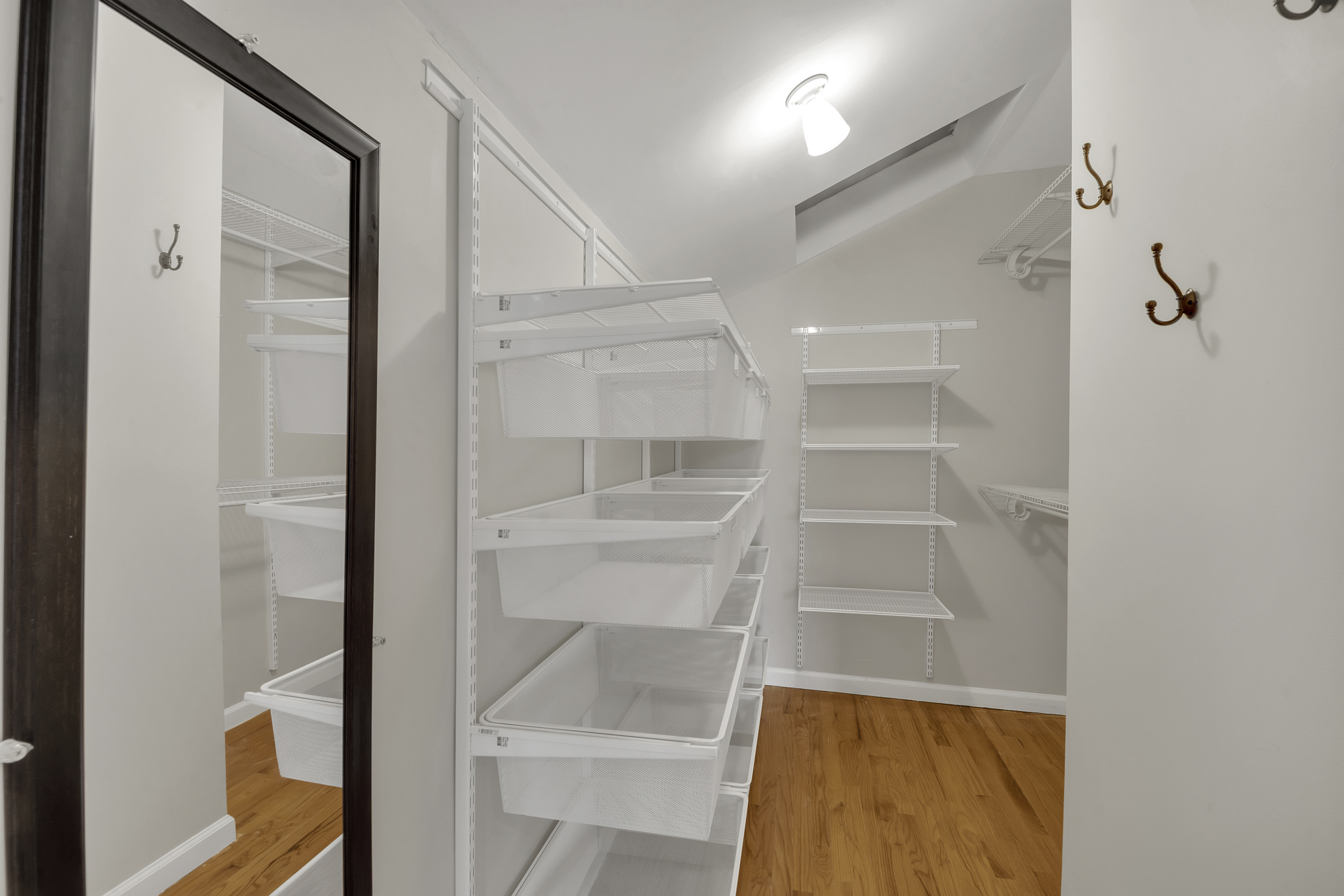 963 Kent Avenue, Unit D3 Brooklyn, NY 11205 - Photo 10 of 16 a view of walk in closet with empty racks