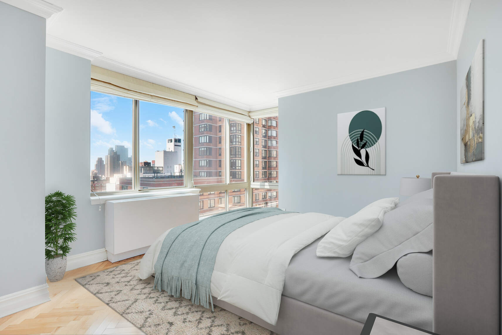 2 Columbus Avenue, Unit 17C Manhattan, NY 10023 - Photo 6 of 26 a bed sitting in a bedroom next to a window