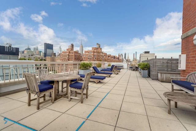 520 West 23rd Street, Unit 8A Manhattan, NY 10011 - Photo 10 of 16 a view of a terrace with furniture