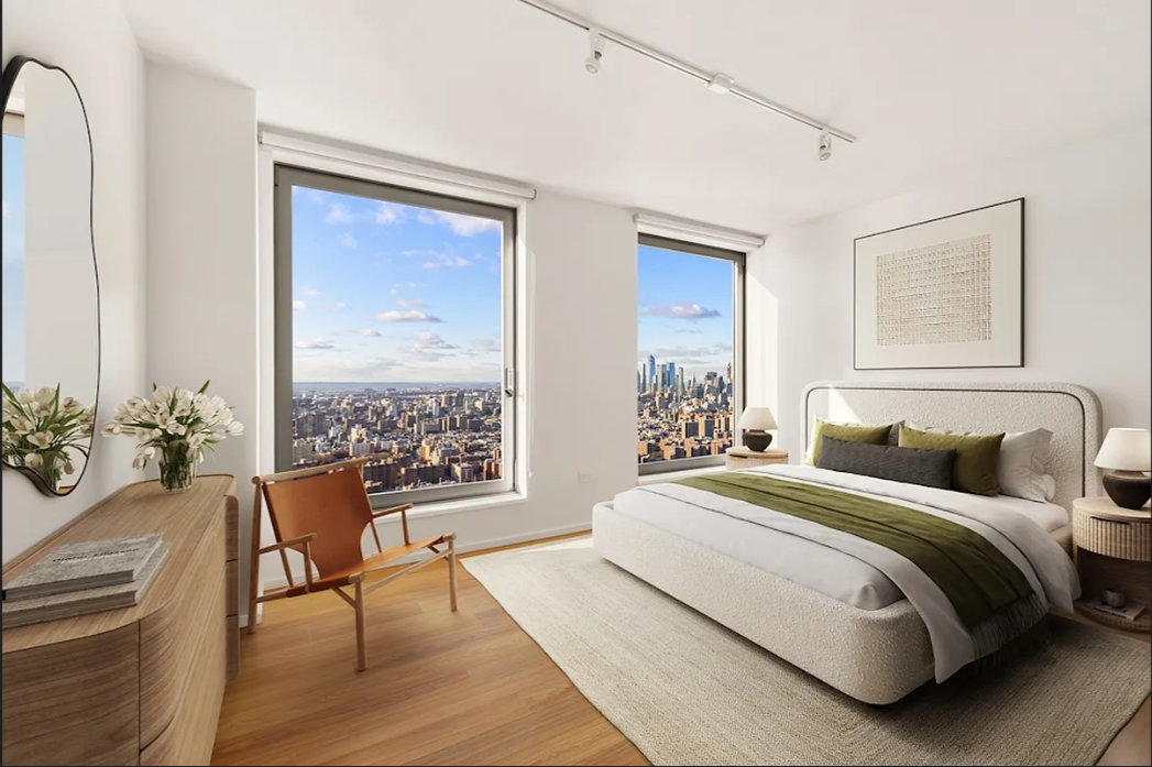 5 South 5th Street, Unit 5300 Brooklyn, NY 11249 - Photo 6 of 28 a bedroom with a bed and a large window