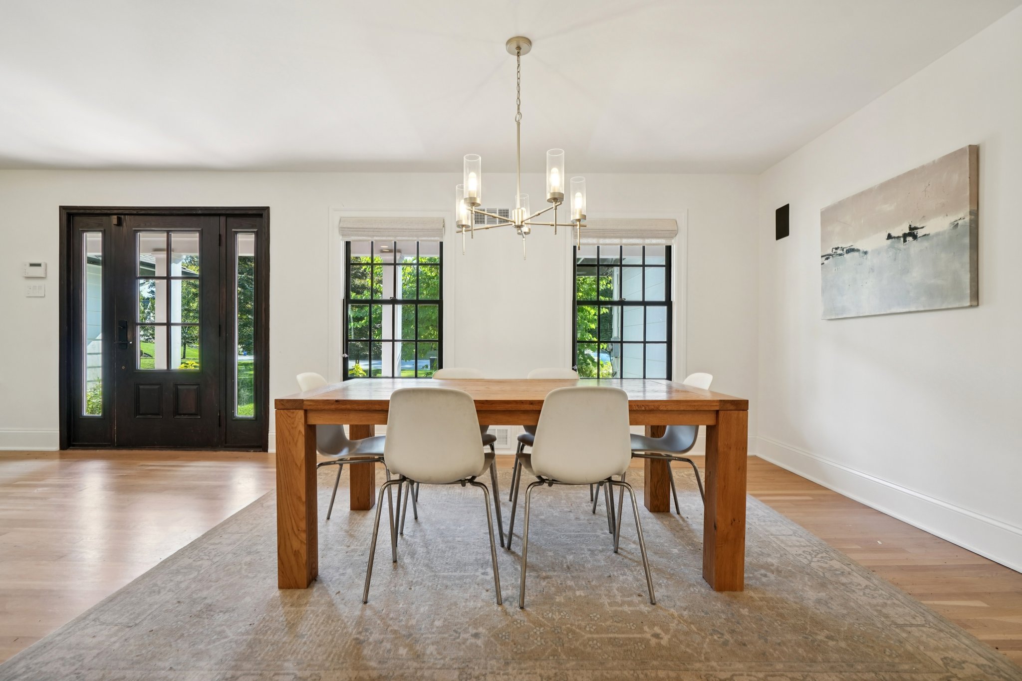 35 Lawrence Road Madison, NJ 07940 - Photo 7 of 35 a view of a dining room with furniture wooden floor and chandelier