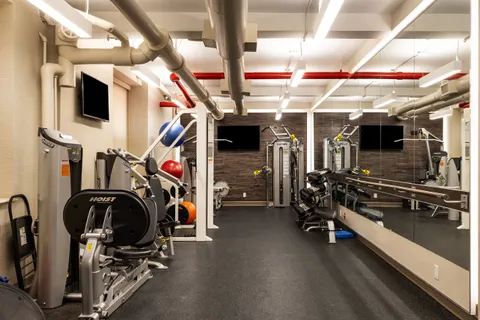 a view of a room with gym equipment