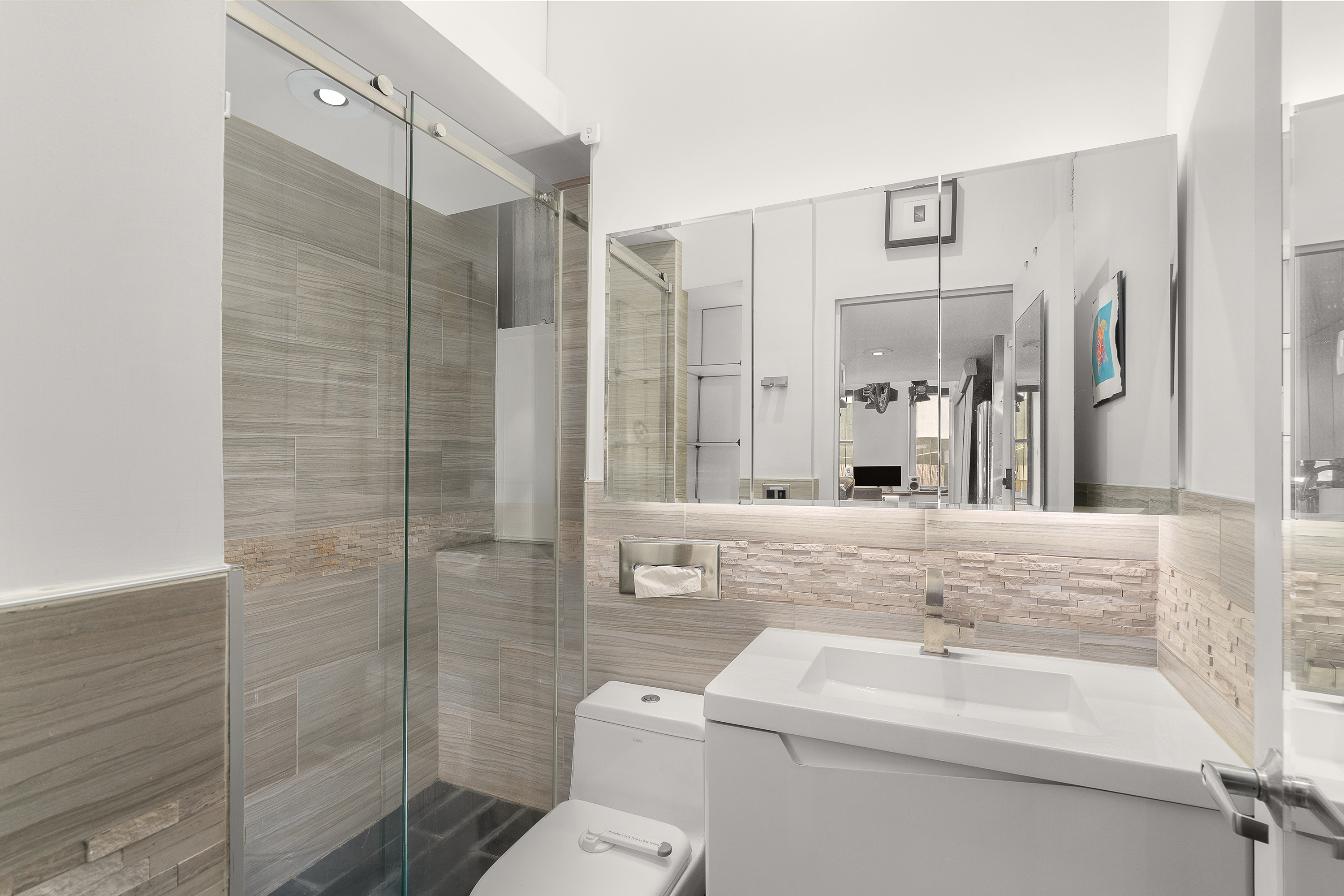 185 East 2nd Street, Unit D Manhattan, NY 10009 - Photo 6 of 6 a bathroom with a sink toilet and shower