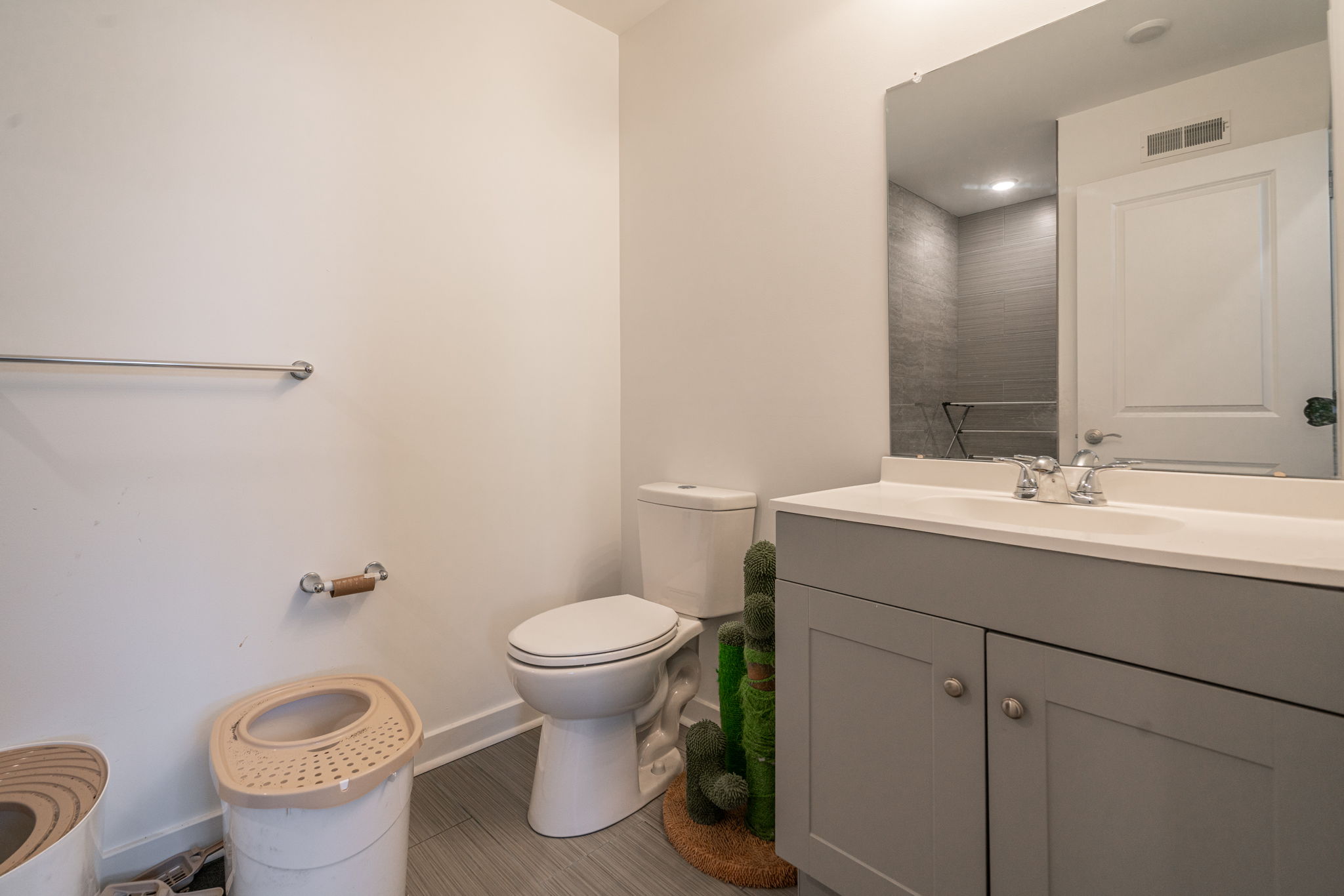 2613 Federal Street, Unit B Philadelphia, PA 19146 - Photo 15 of 21 a bathroom with a sink toilet and a mirror