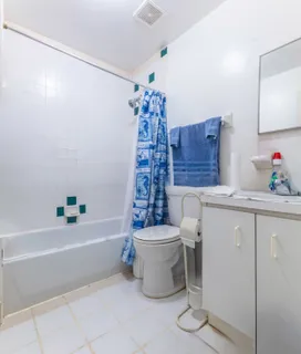 a bathroom with a bathtub a sink and a toilet