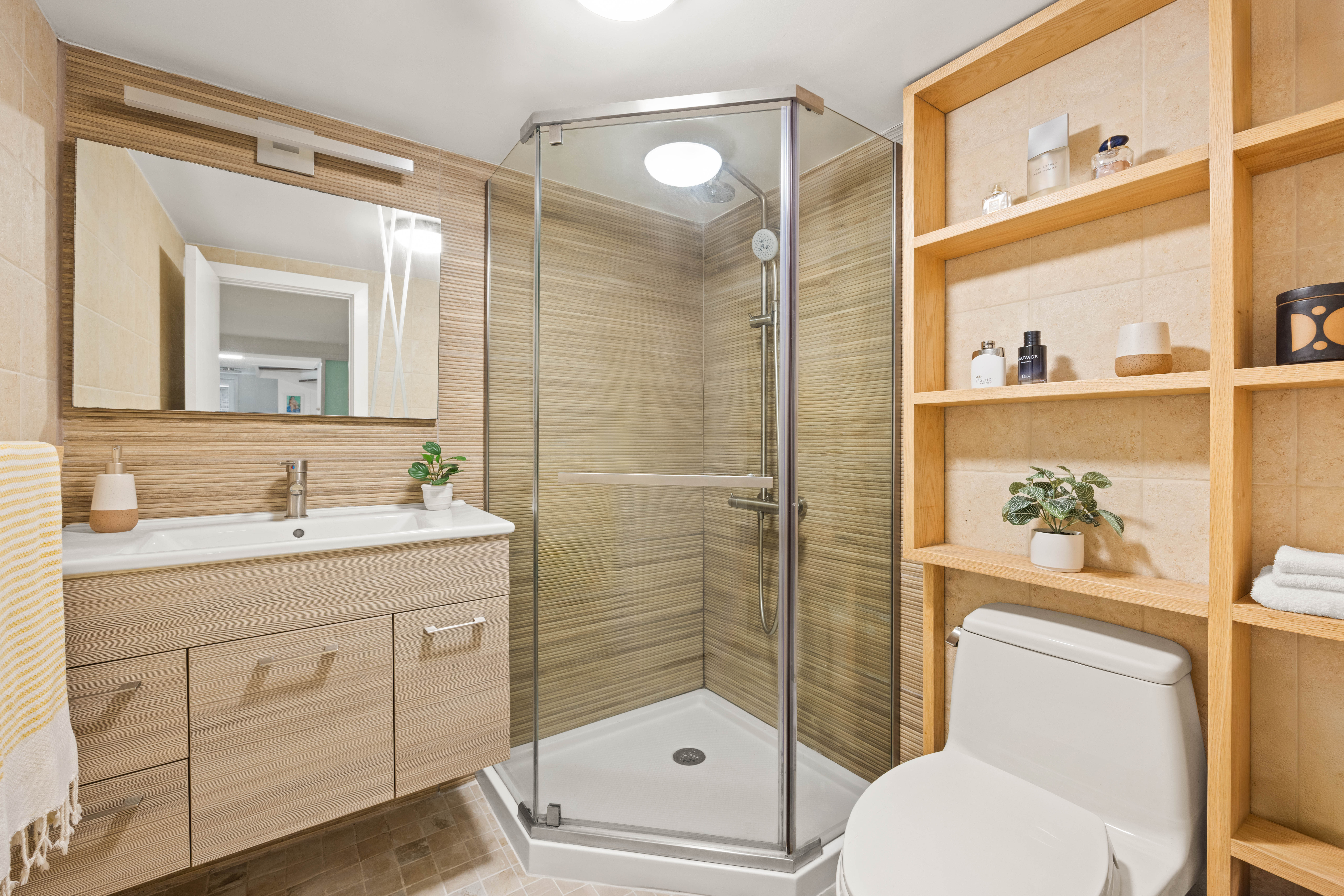 38 7th Avenue, Unit 1 Brooklyn, NY 11217 - Photo 10 of 13 a bathroom with a sink a toilet and shower