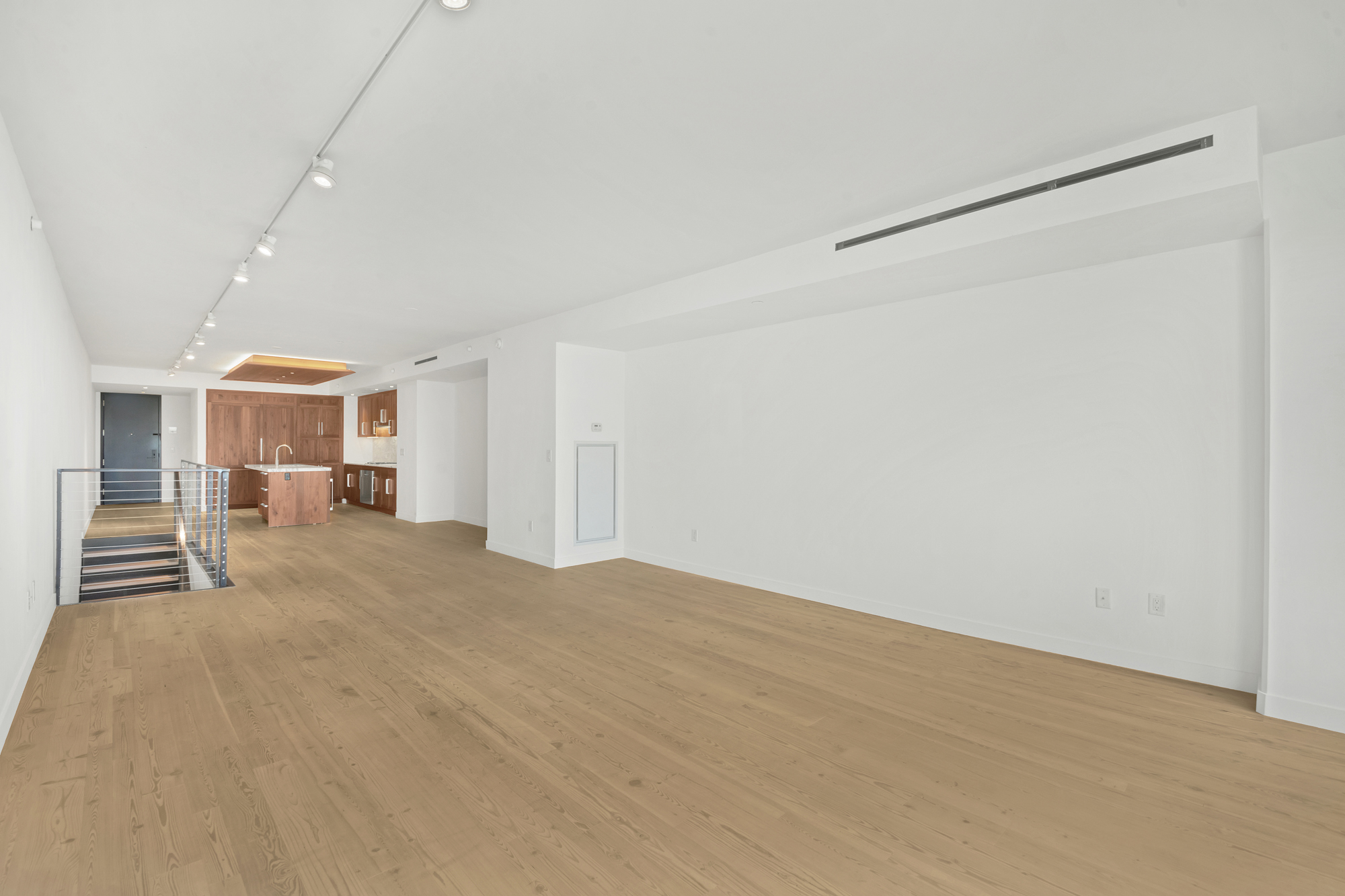 90 Furman Street, Unit N405 Brooklyn, NY 11201 - Photo 22 of 36 a view of empty room with wooden floor
