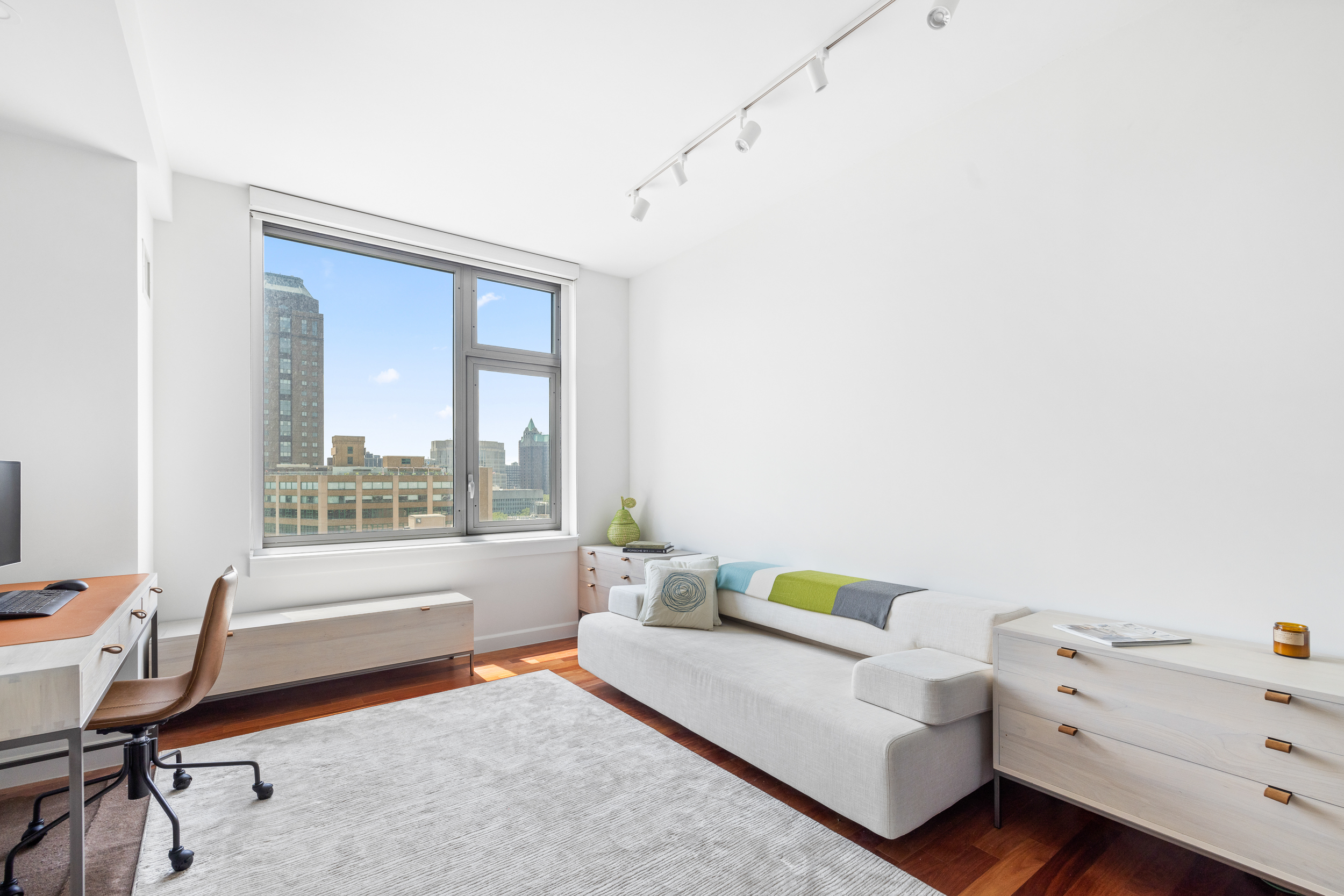 100 Jay Street, Unit 20F Brooklyn, NY 11201 - Photo 13 of 20 a bedroom with furniture and a window