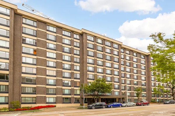 a view of a building and a street