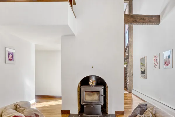 a bedroom with bed and a window