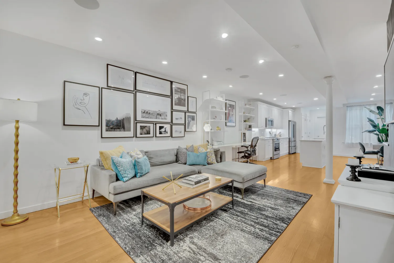 a living room with furniture and a table
