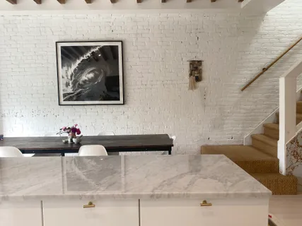 a front view of a house with a bathtub