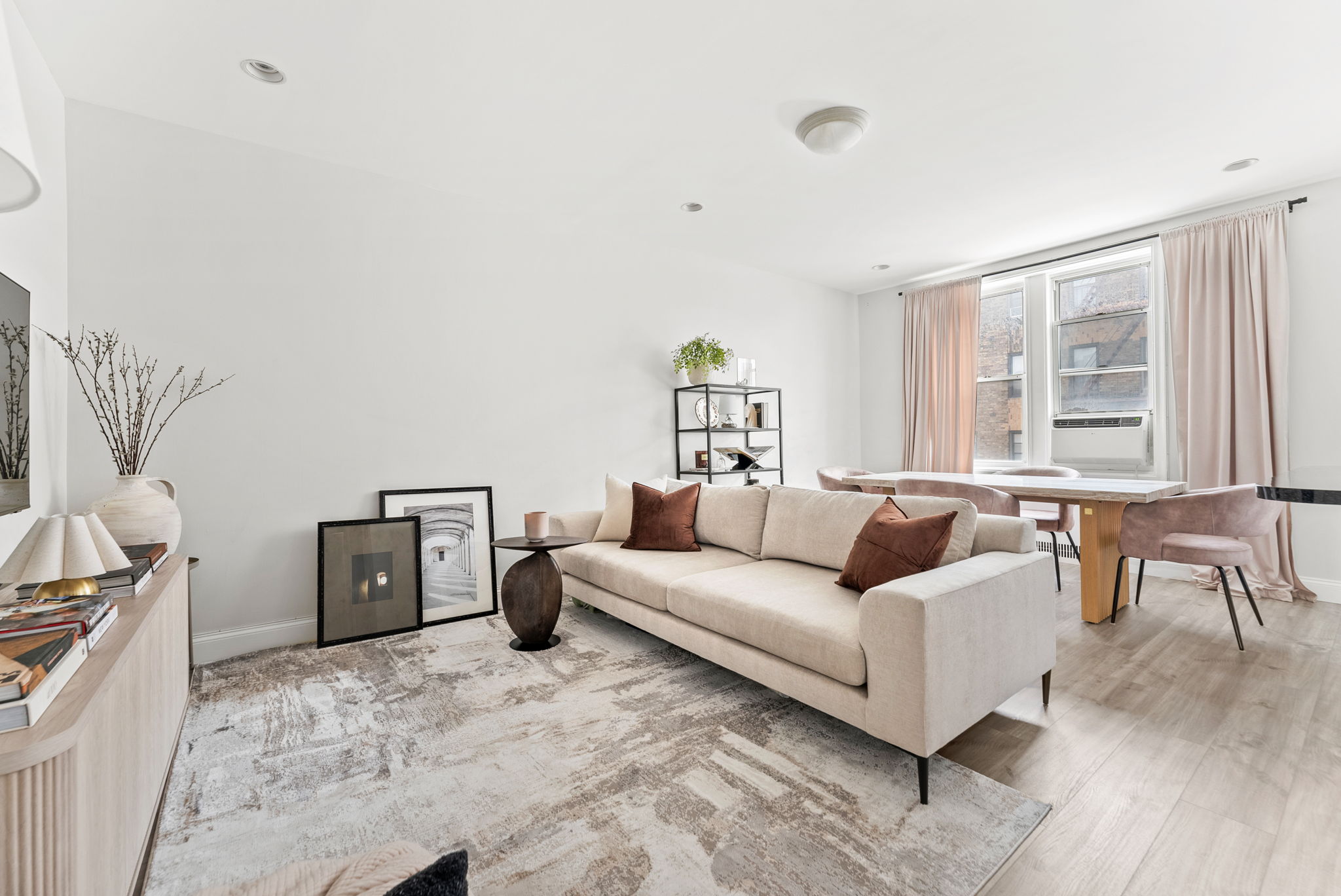 9615 Shore Road, Unit 4B Brooklyn, NY 11209 - Photo 4 of 13 a living room with furniture and a window