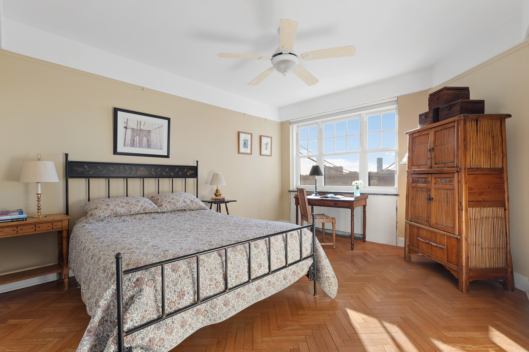 140 Cabrini Boulevard, Unit 18/19 Manhattan, NY 10033 - Photo 12 of 21 a bedroom with a bed and a refrigerator