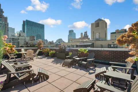 a view of a terrace with sitting area