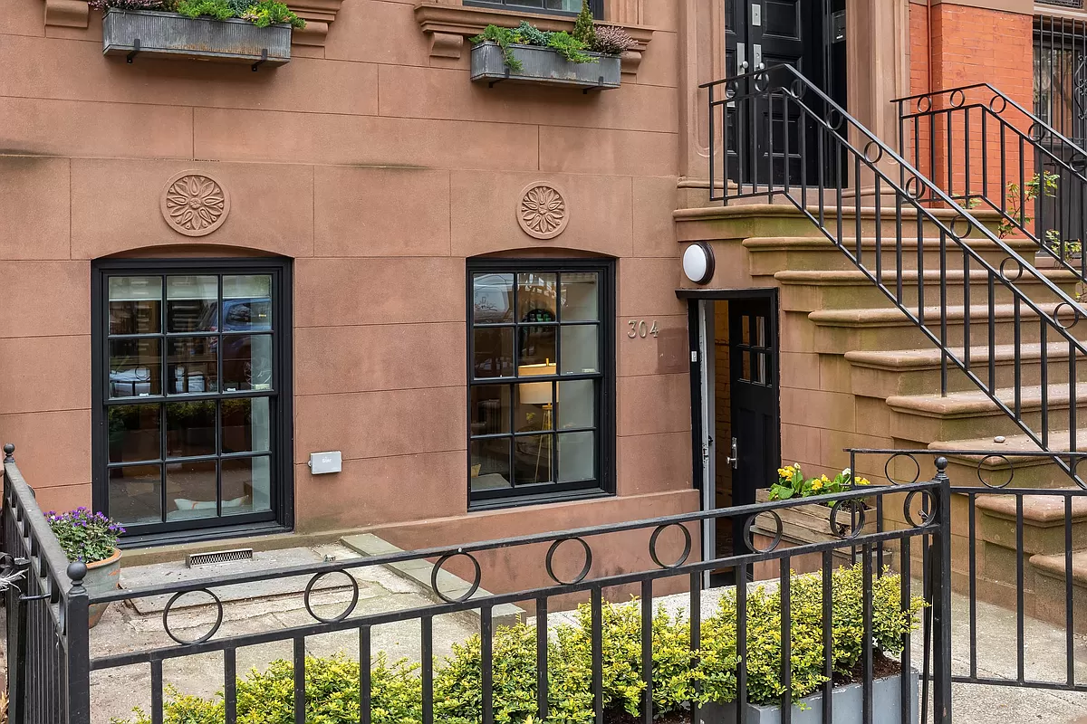 304 Warren Street, Unit 1 Brooklyn, NY 11201 - Photo 15 of 16 a view of a brick house with a large window