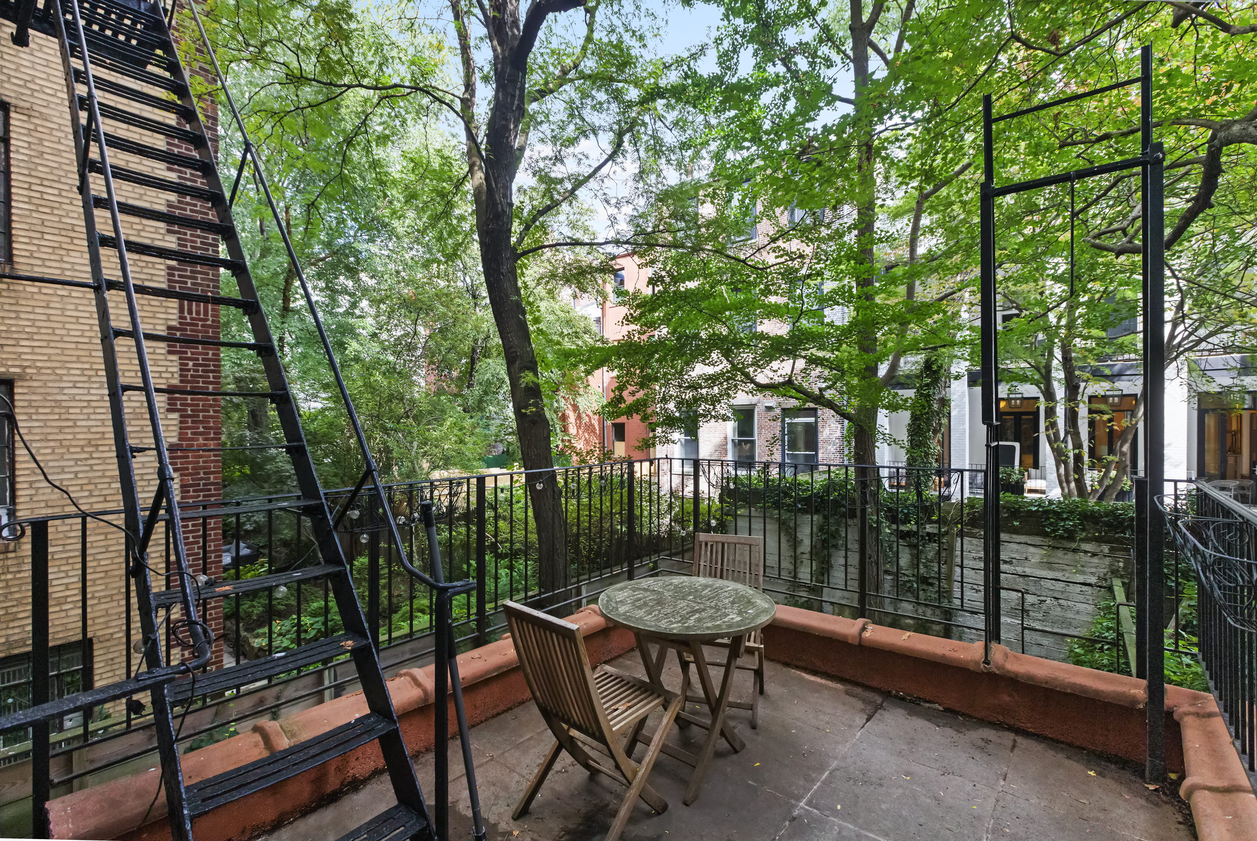 427 West 21st Street, Unit PARLOR Manhattan, NY 10011 - Photo 15 of 19 a view of backyard with seating and green space