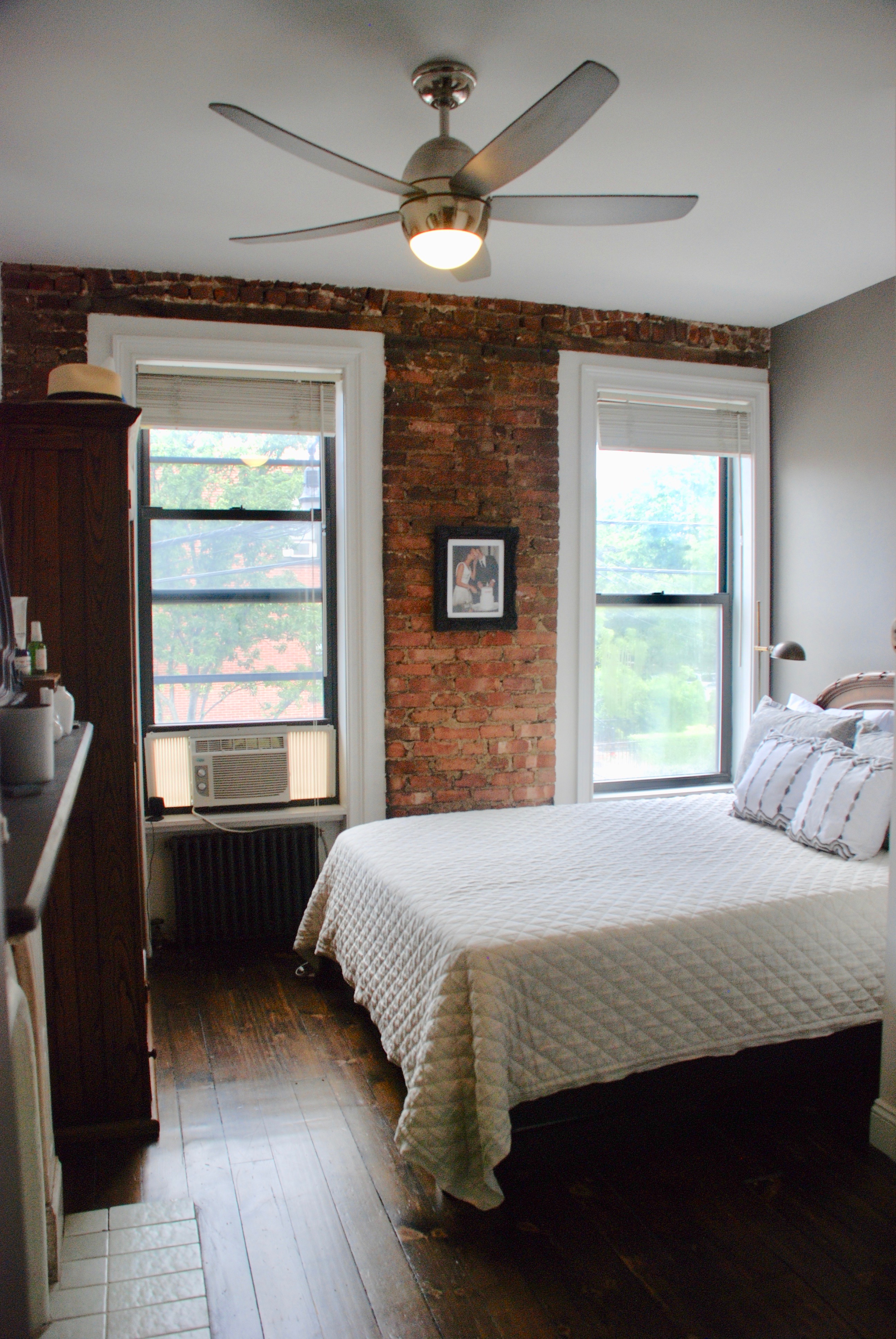 511 Clinton Street, Unit 2 Brooklyn, NY 11231 - Photo 7 of 12 a bedroom with a bed and a window