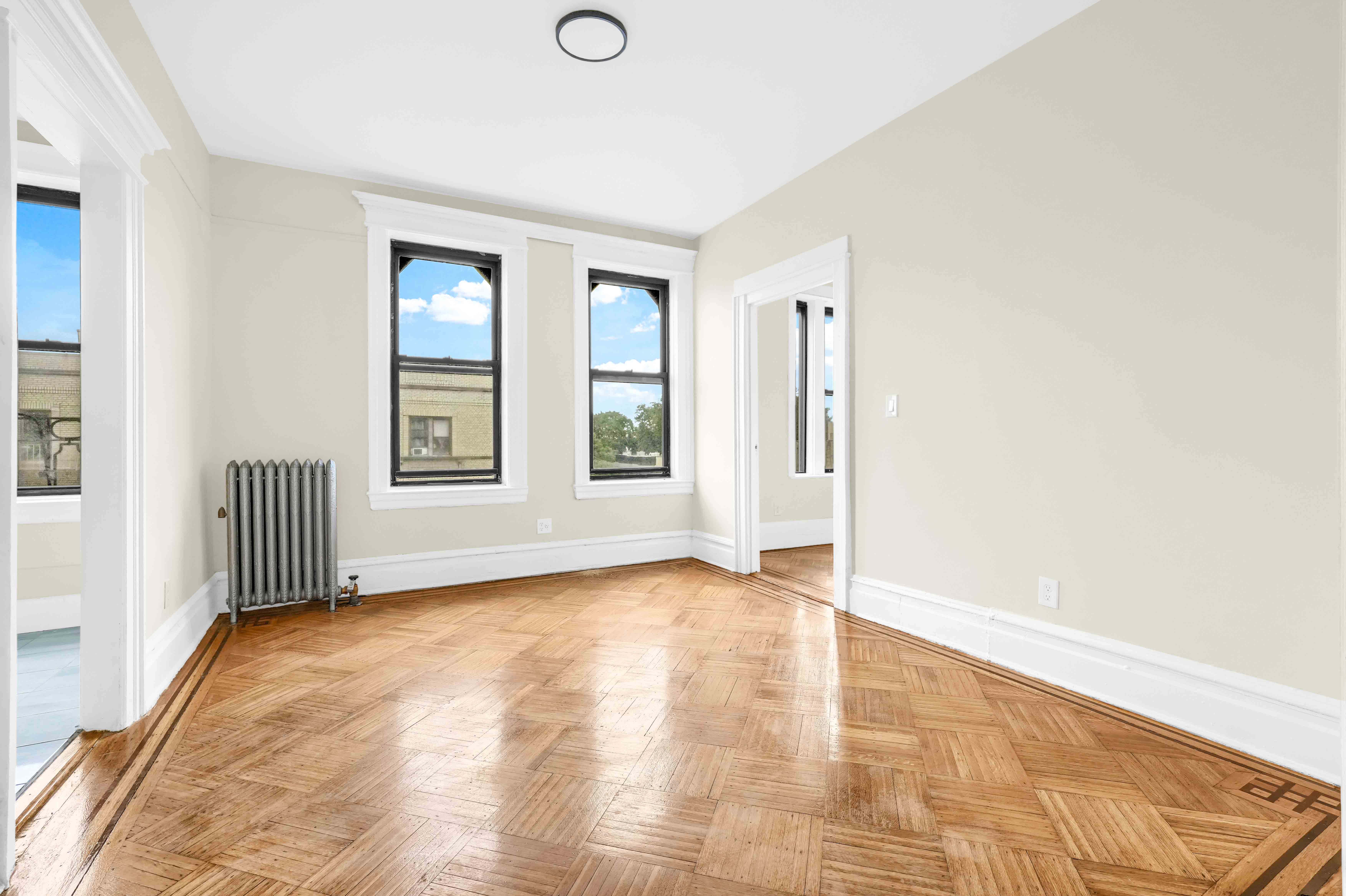 1770 Bedford Avenue Brooklyn, NY 11225 - Photo 33 of 50 an empty room with windows
