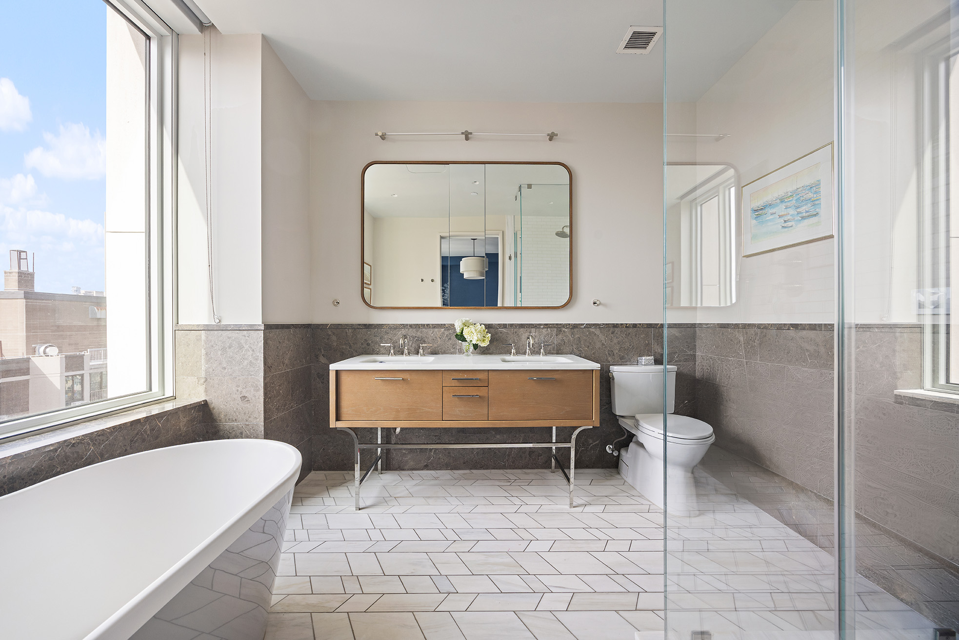 1 Clinton Street, Unit 12A Brooklyn, NY 11201 - Photo 13 of 29 a bathroom with a tub sink and mirror