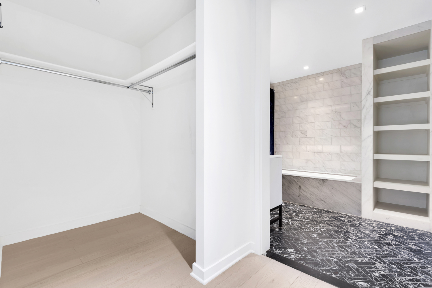 959 1st Avenue, Unit 6P Manhattan, NY 10022 - Photo 6 of 12 a view of walk in closet with empty racks