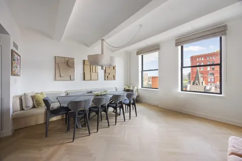a big room with closet and mirror