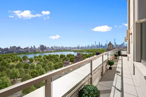 a view of a city from a balcony