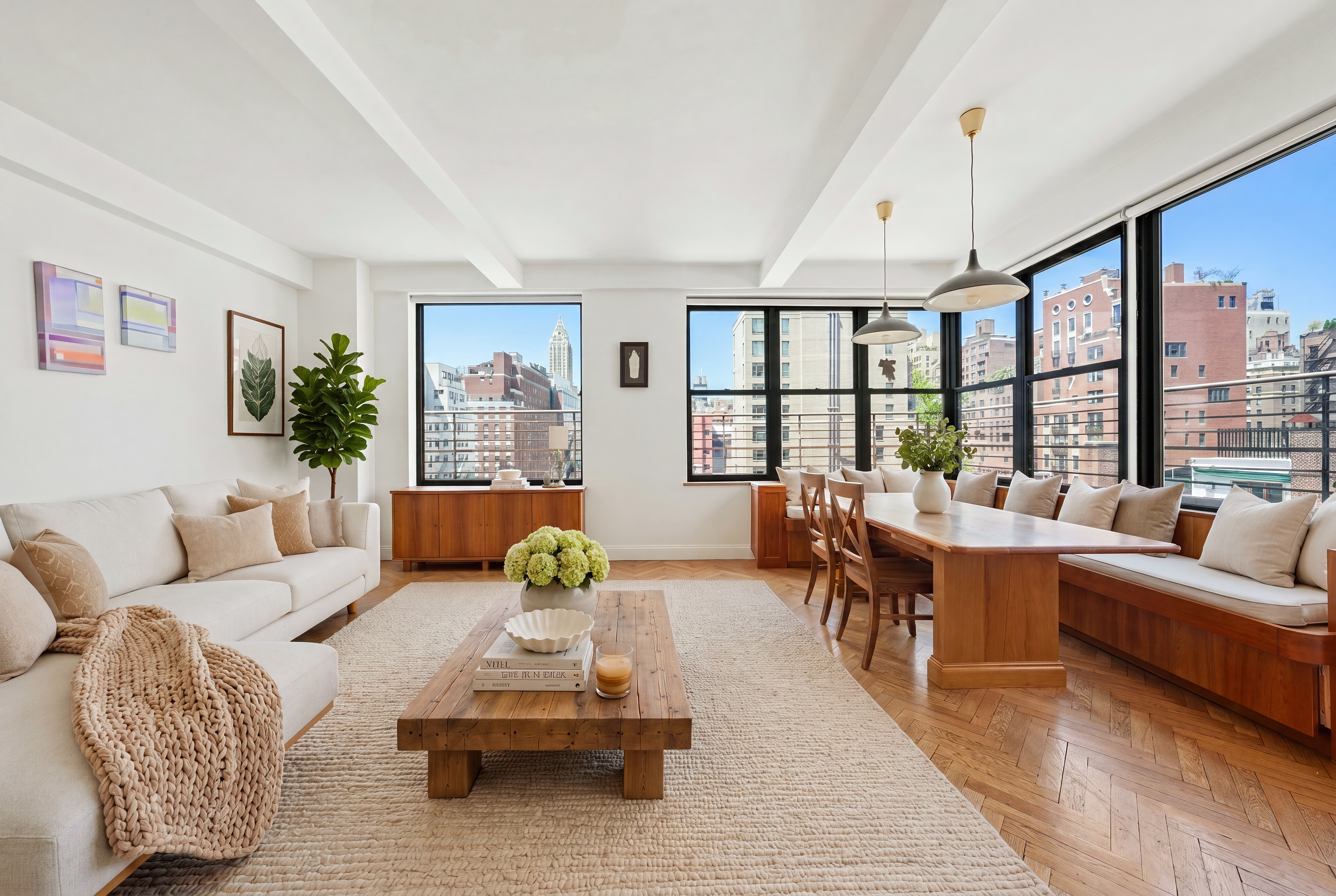 177 East 77th Street, Unit PHC Manhattan, NY 10075 - Photo 2 of 26 a living room with furniture and a large window
