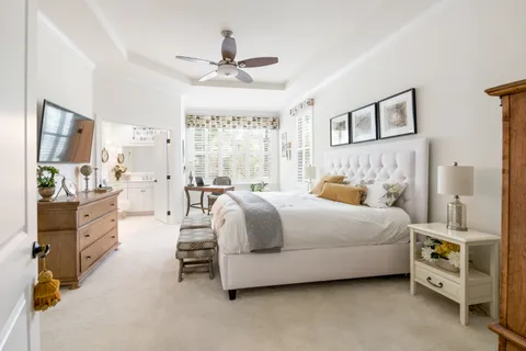 a bedroom with a bed and furniture