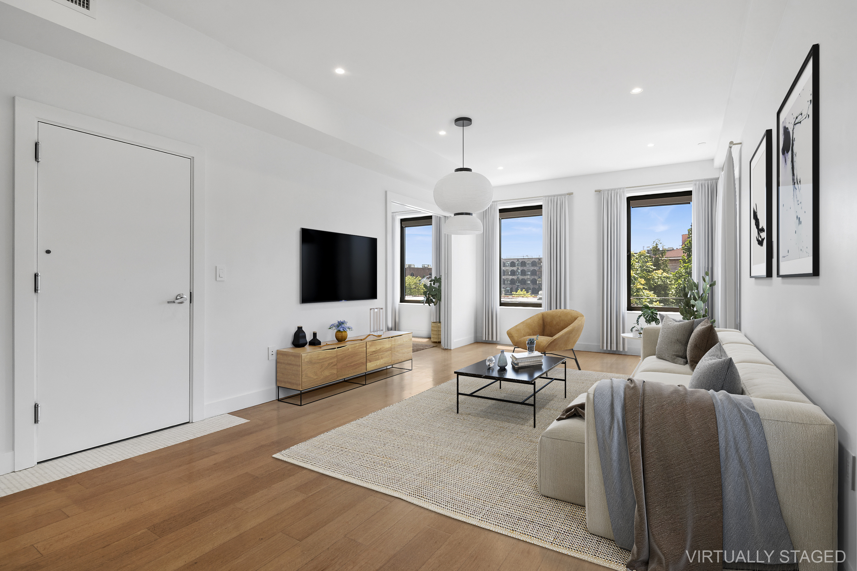 162 Beard Street, Unit 3 Brooklyn, NY 11231 - Photo 3 of 12 a living room with furniture and a flat screen tv