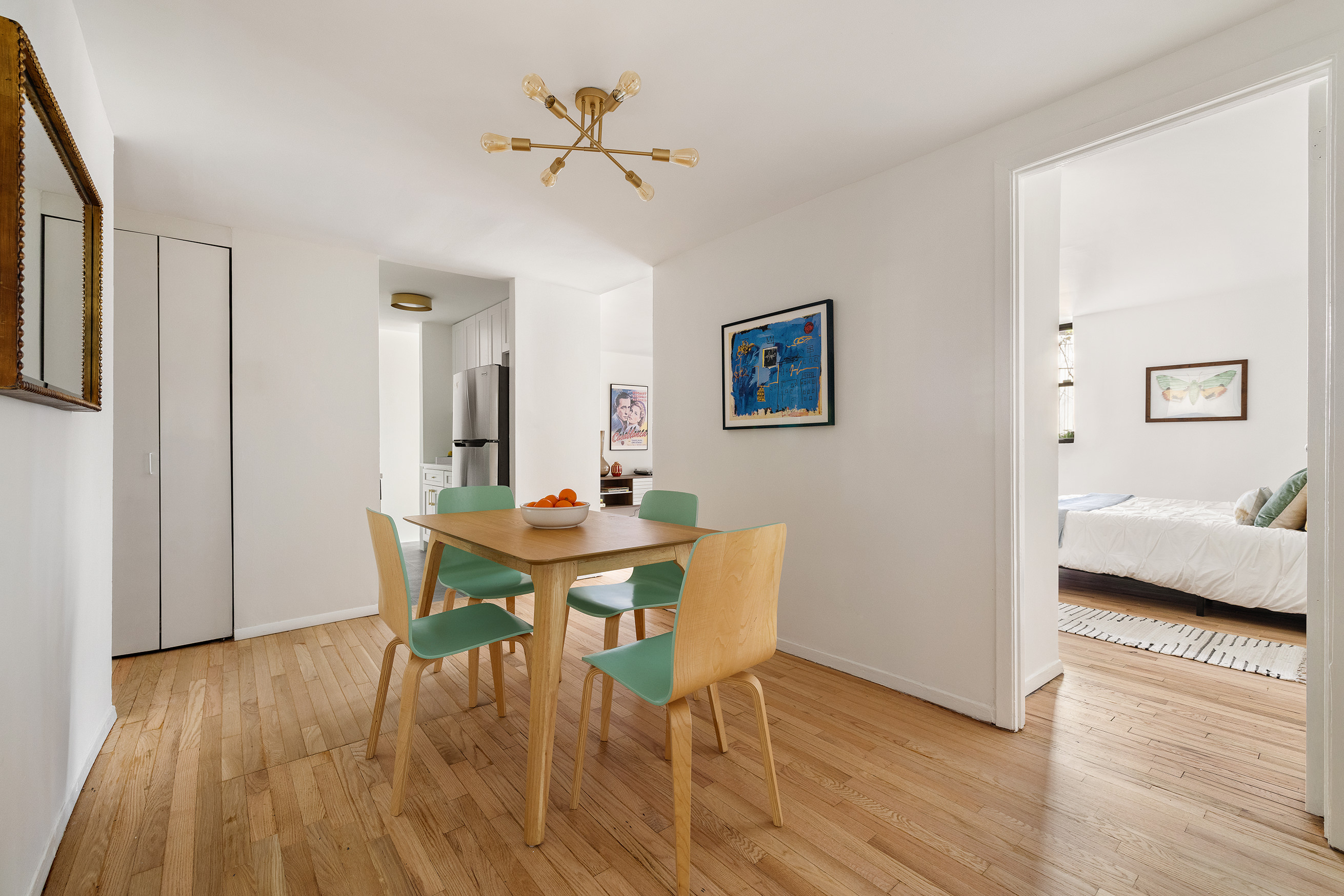 195 Garfield Place, Unit 1L Brooklyn, NY 11215 - Photo 10 of 17 a view of a dining room with furniture and wooden floor