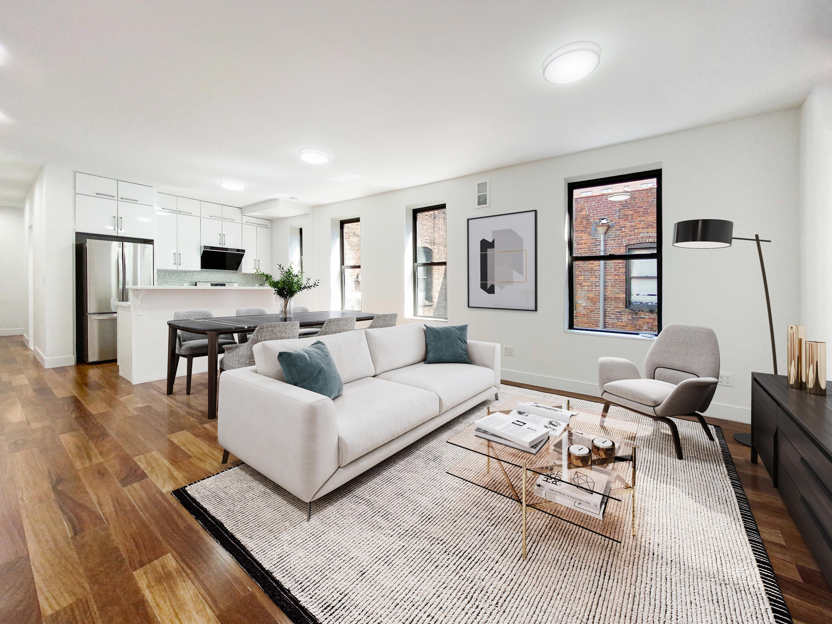 a living room with furniture and wooden floor