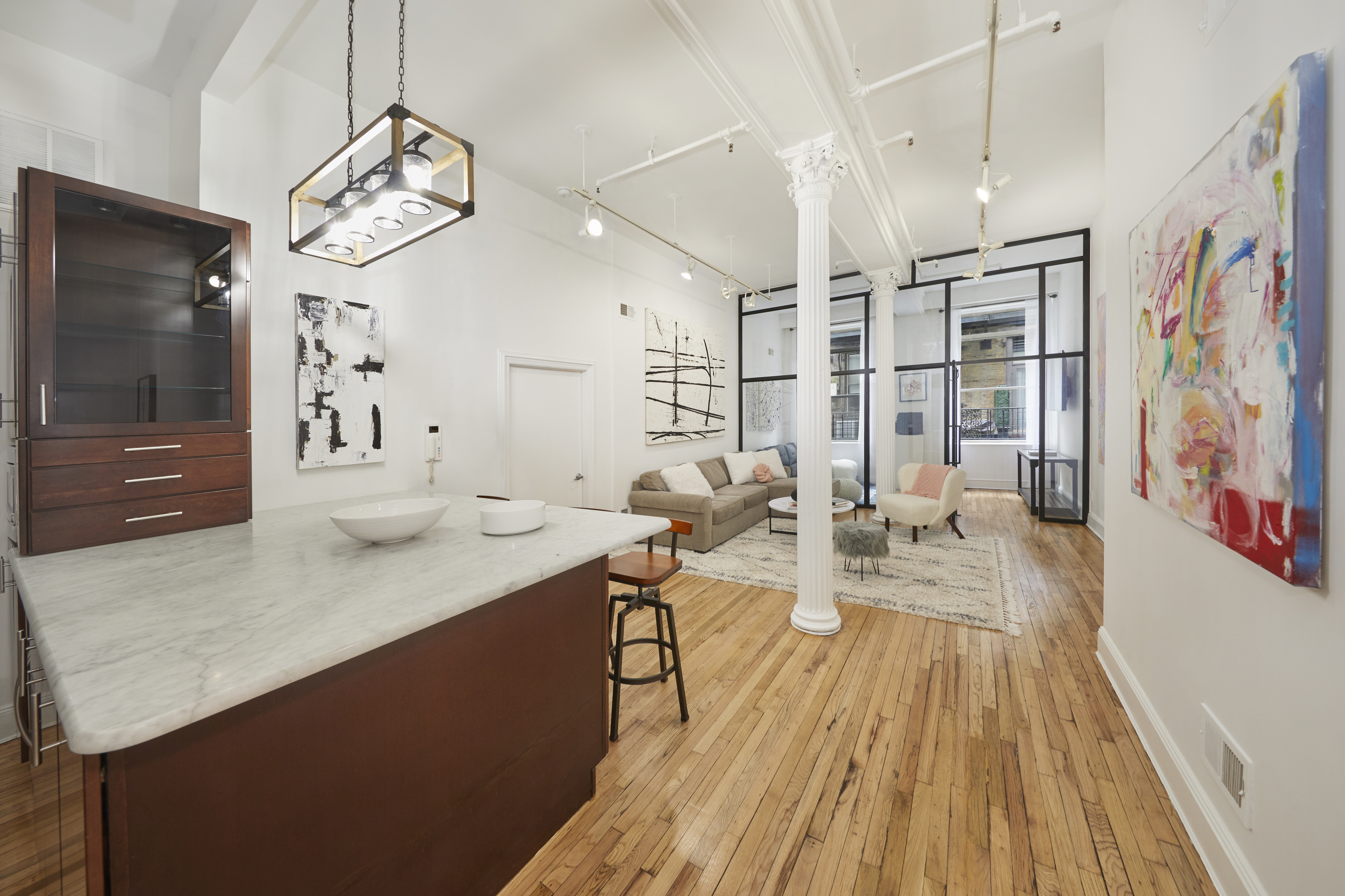 80 Leonard Street, Unit 3G Manhattan, NY 10013 - Photo 6 of 30 a very nice looking dining room with a large window