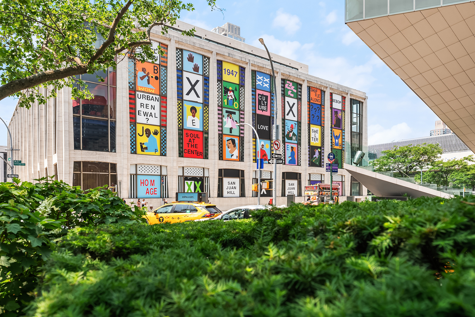 150 Columbus Avenue, Unit 22A Manhattan, NY 10023 - Photo 19 of 23 a front view of building with yard and outdoor seating